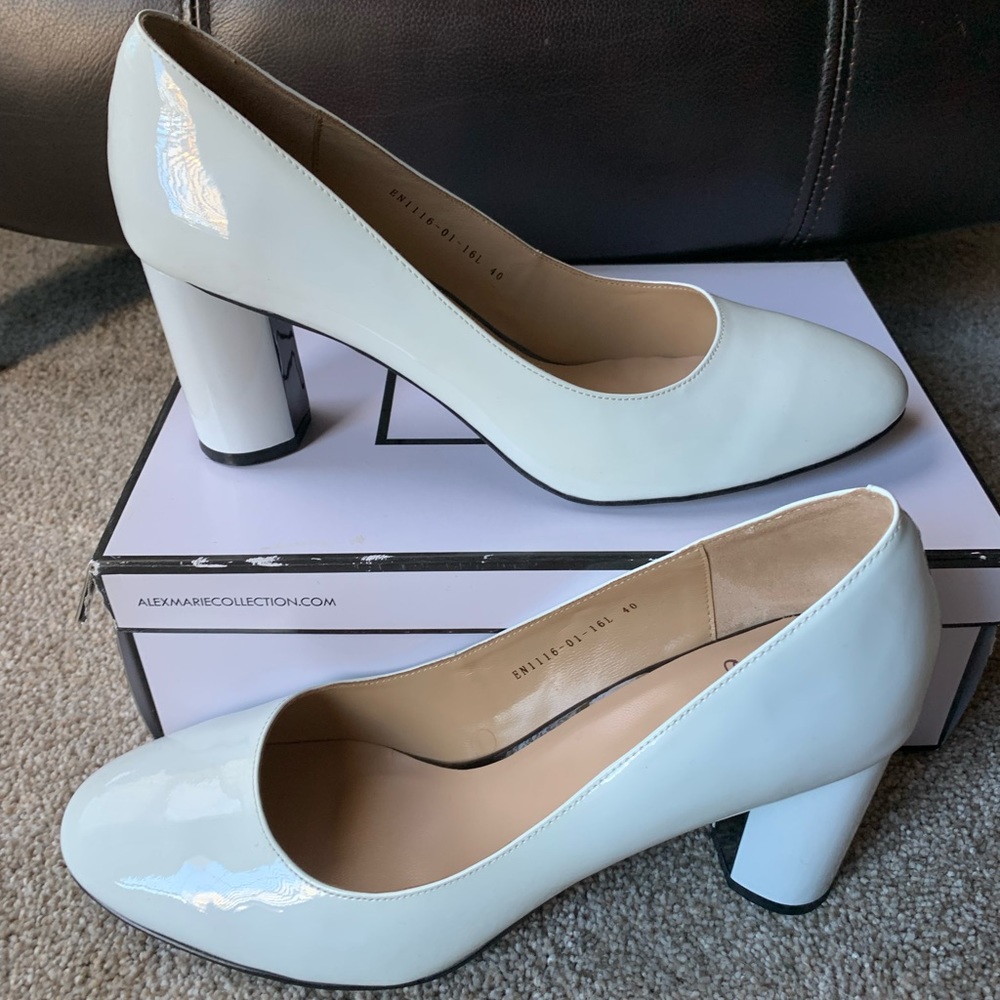 Bran new white glossy 3” pumps by European Ekonika